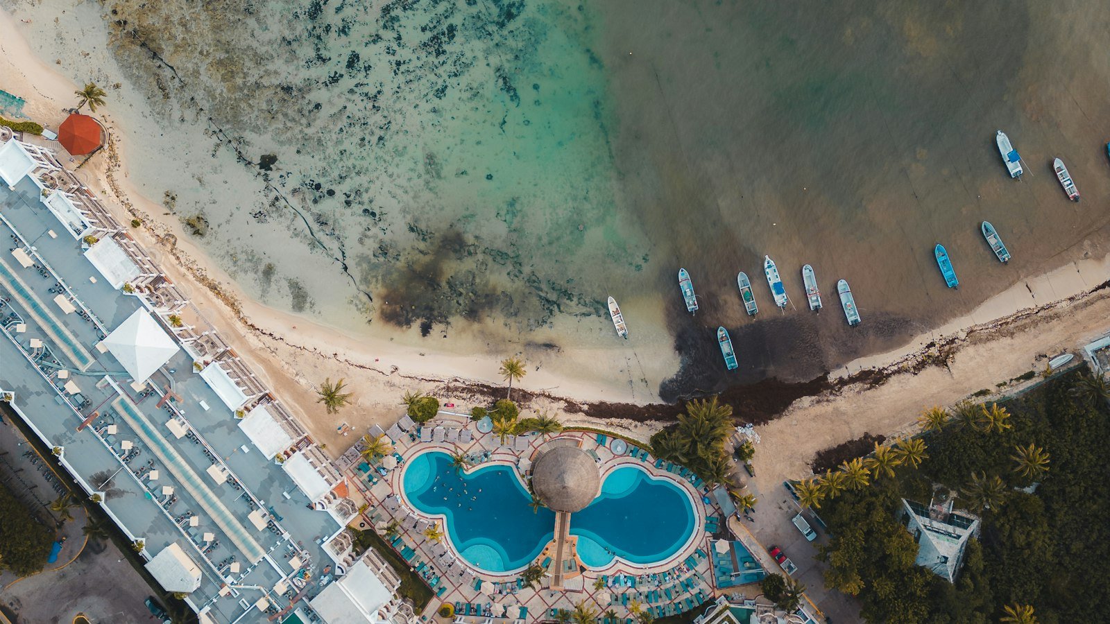 Where to Stay in Cancun: Hotel Zone vs Downtown vs Playa Mujeres (2026)